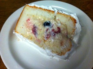 cut strawberry cream cake