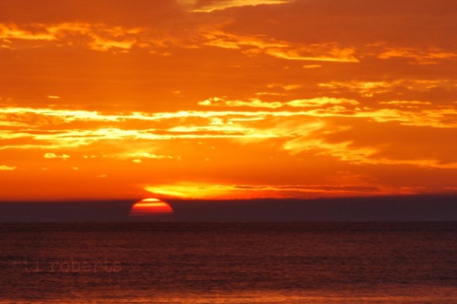 blood orange sunset at the beach
