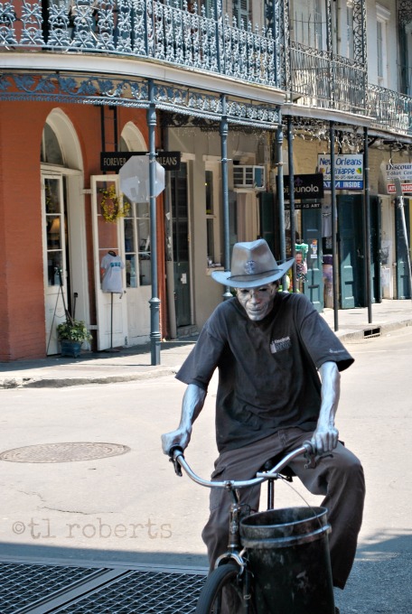New Orleans silverman riding a bicycle