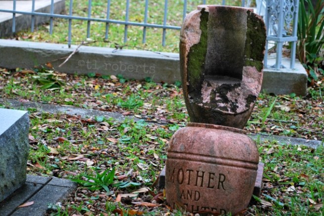 broken gravestone urn
