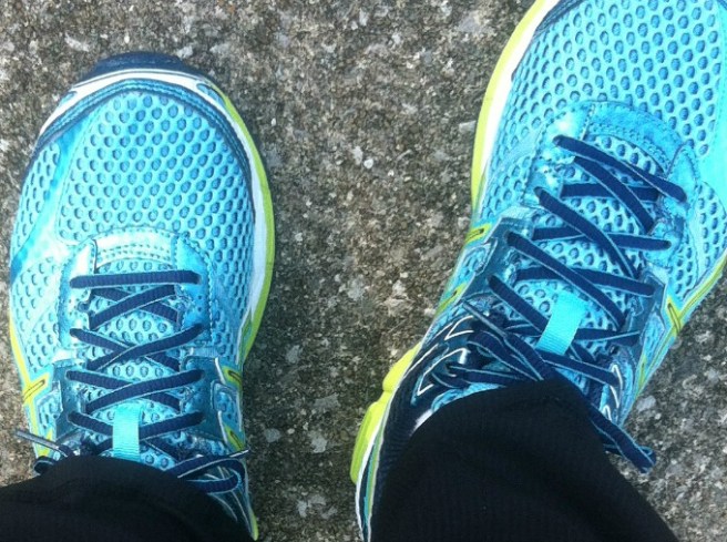 blue and green asics walking shoes