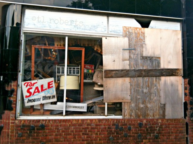 abandoned store front window