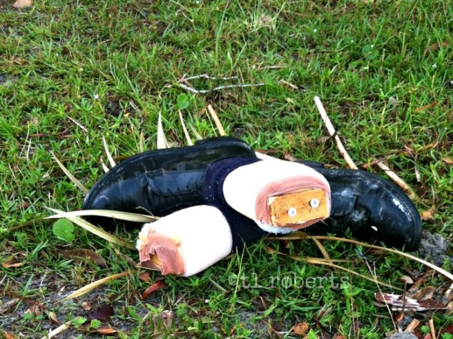 discarded mannequin feet