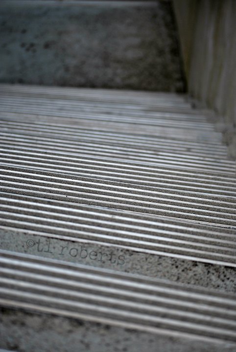 black and white, concrete stairwell