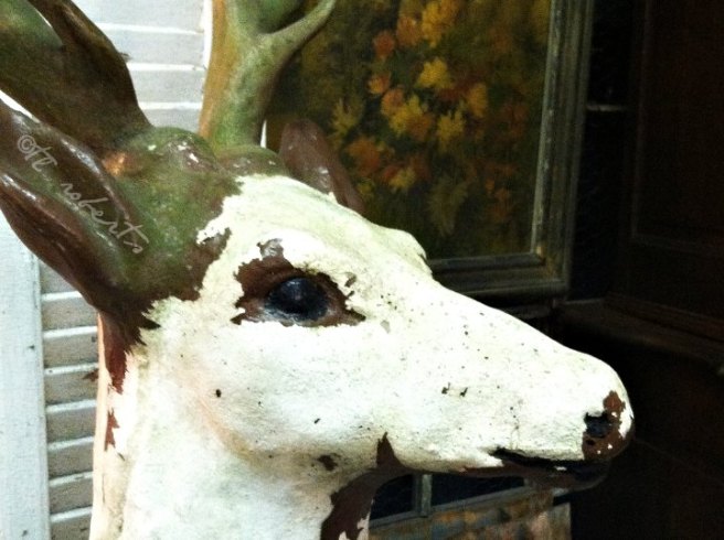 whitewashed wooden deer