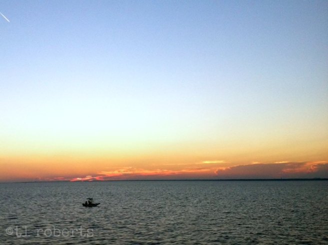 boat on the water at sunset