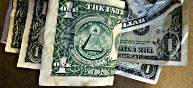 handful of one dollar bills