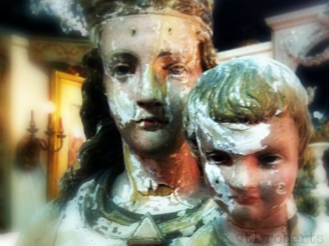 wooden statue of mother and child