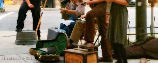 cropped image of street performers