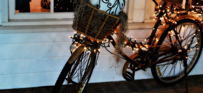 bicycle and white string lights