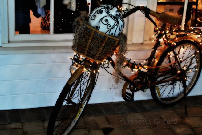 bicycle and white string lights