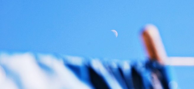 waxing crescent in day sky