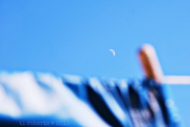 waxing crescent in day sky