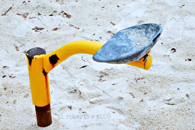 rusty playground seat