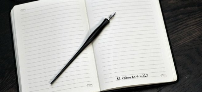 blank journal and quill