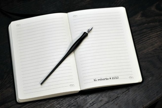 blank journal and quill